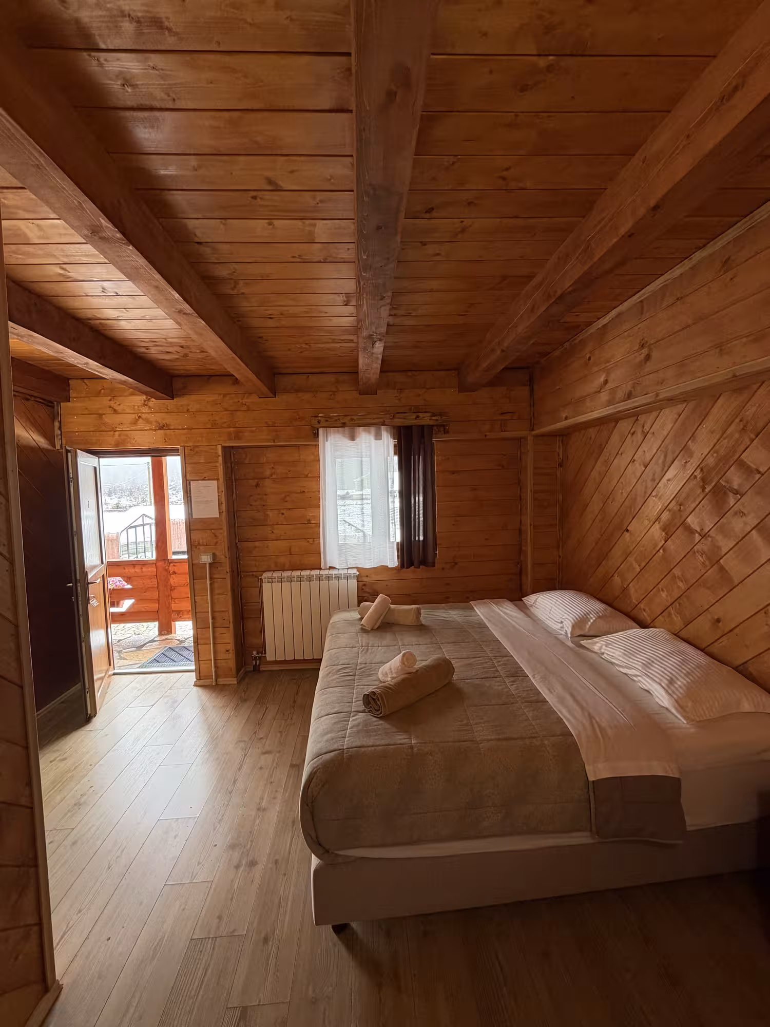 Triple Room 1 - Warm wooden interior